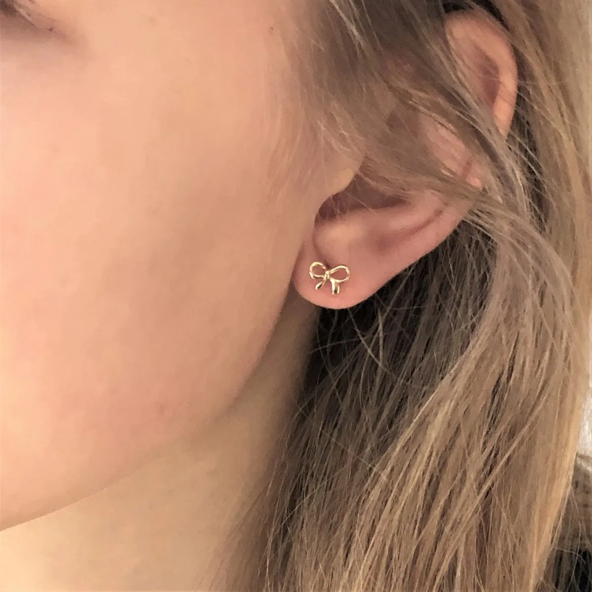 14 Karat Yellow Gold Graceful Bow Earrings