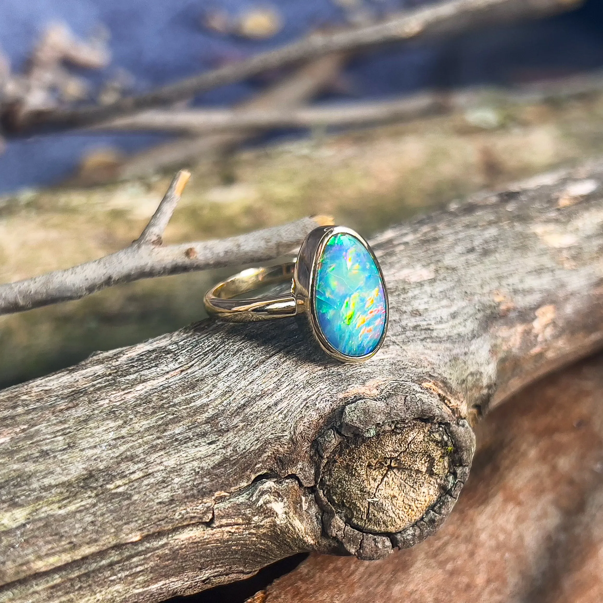 14kt Yellow Gold solitaire Black Opal 2.9ct doublet bezel set ring