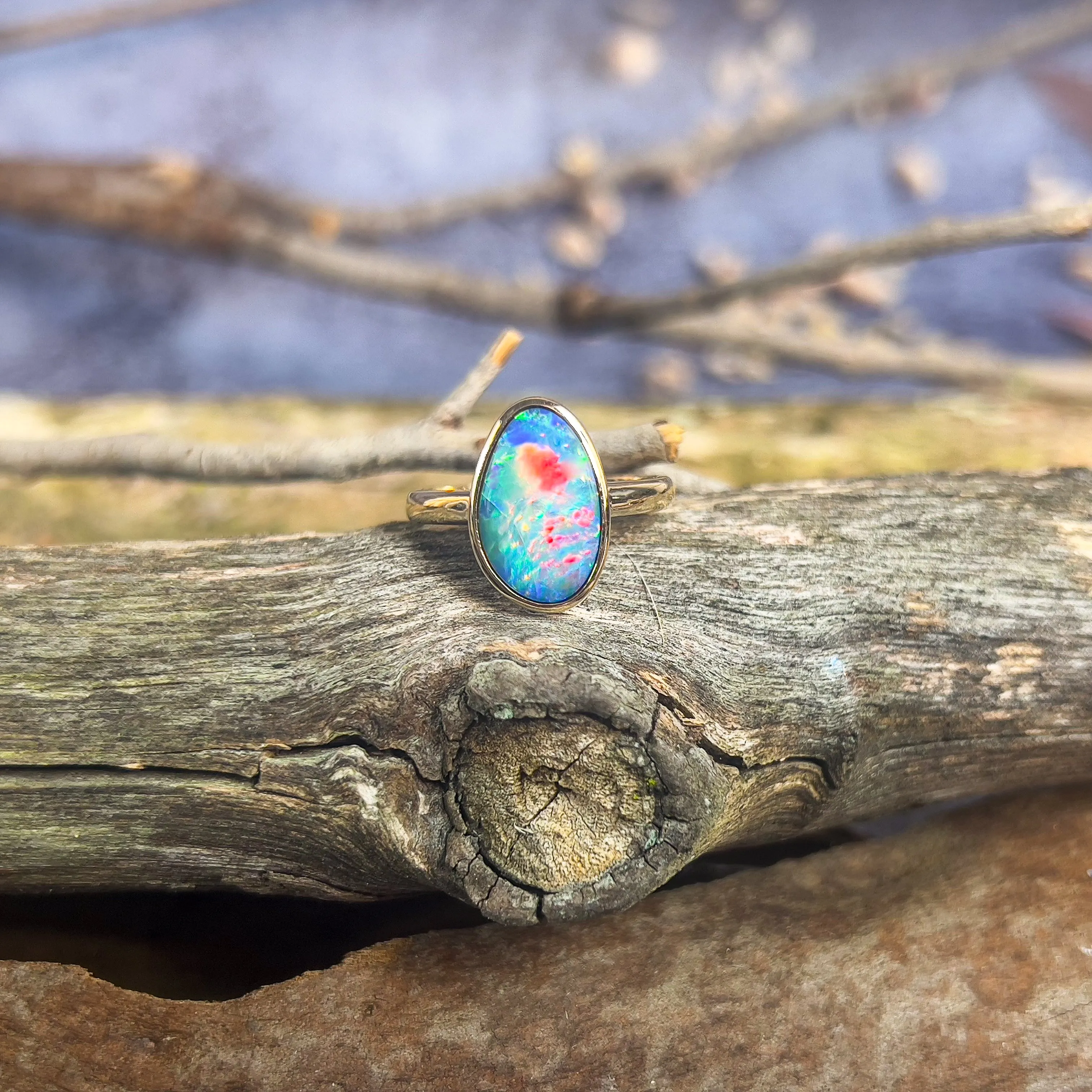 14kt Yellow Gold solitaire Black Opal 2.9ct doublet bezel set ring