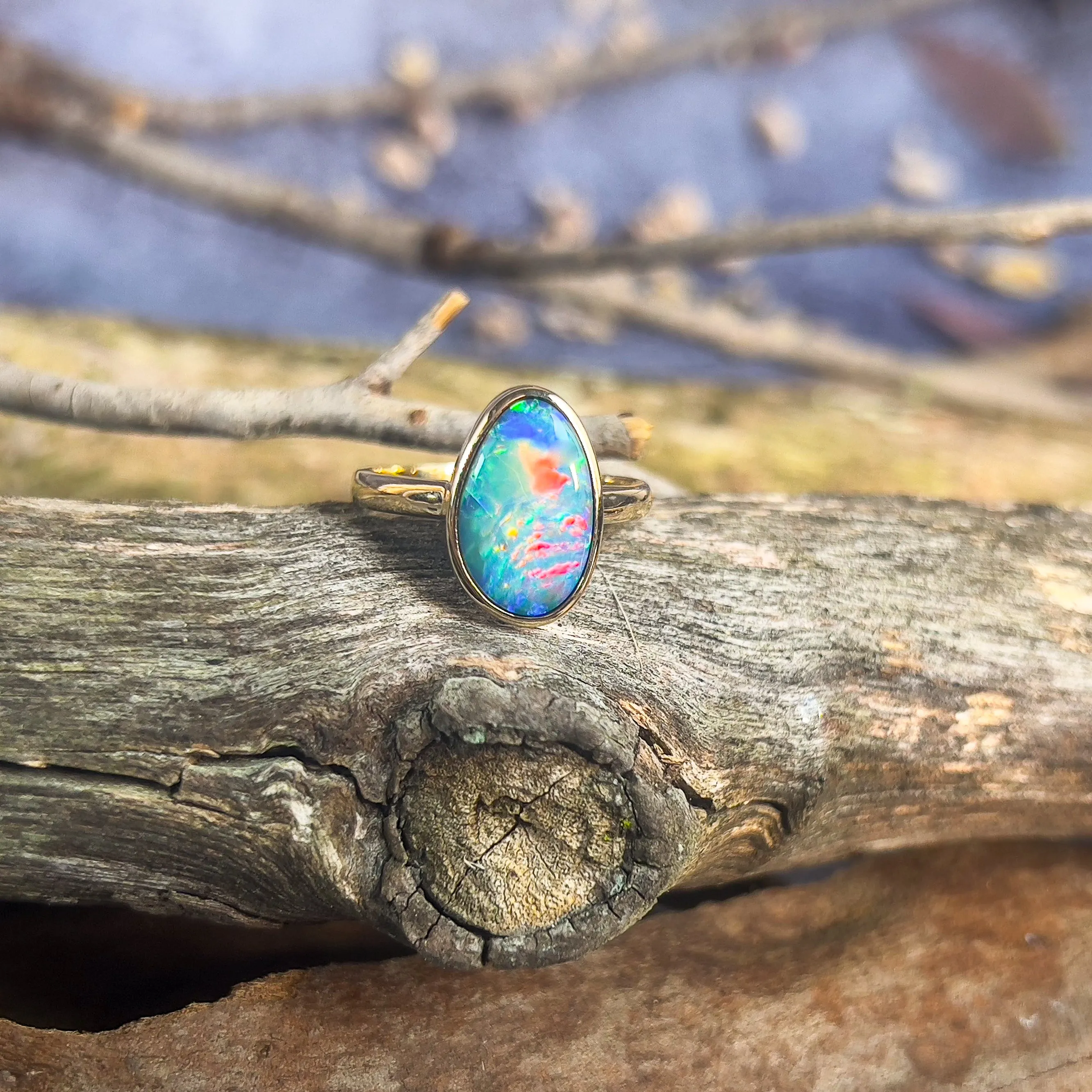 14kt Yellow Gold solitaire Black Opal 2.9ct doublet bezel set ring