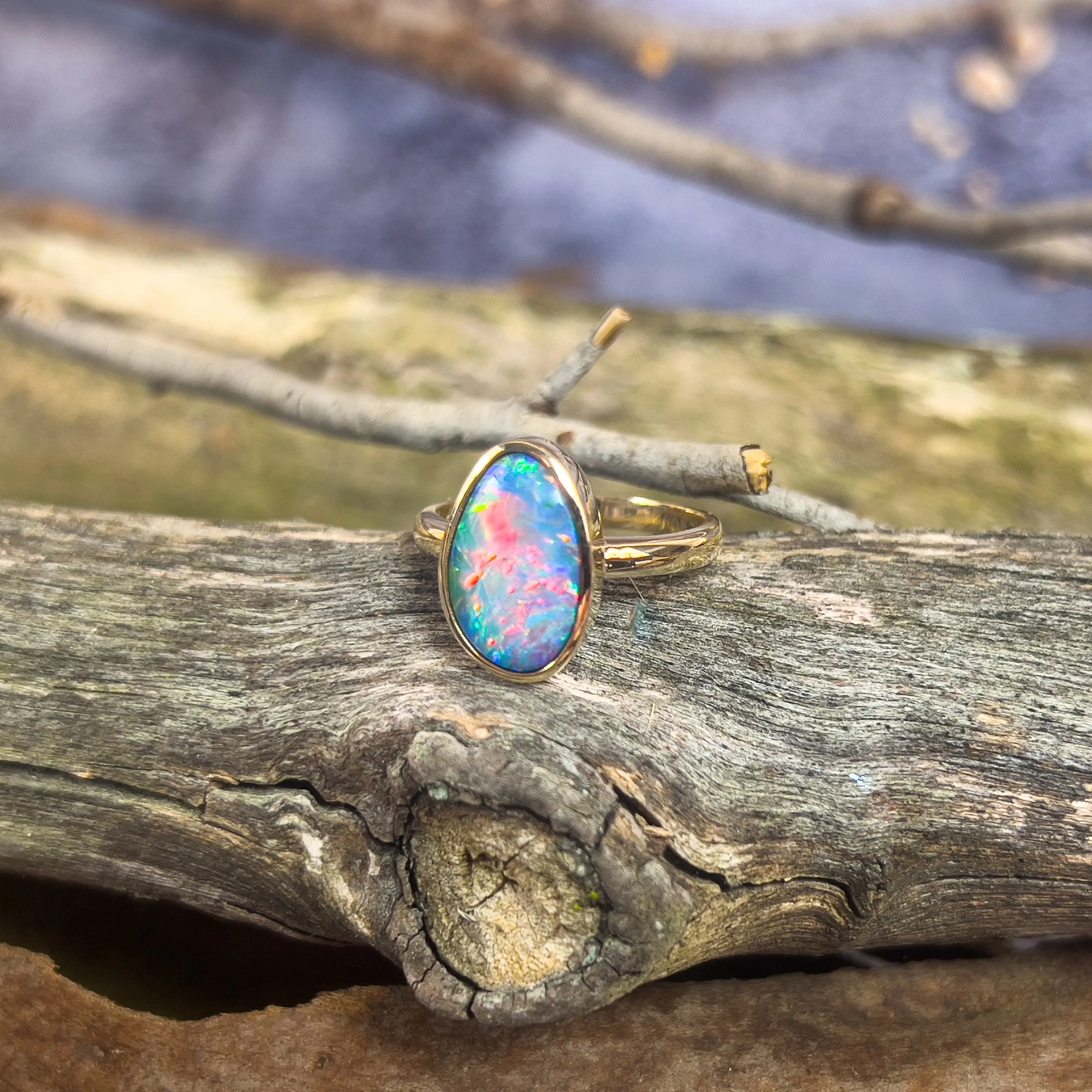 14kt Yellow Gold solitaire Black Opal 2.9ct doublet bezel set ring