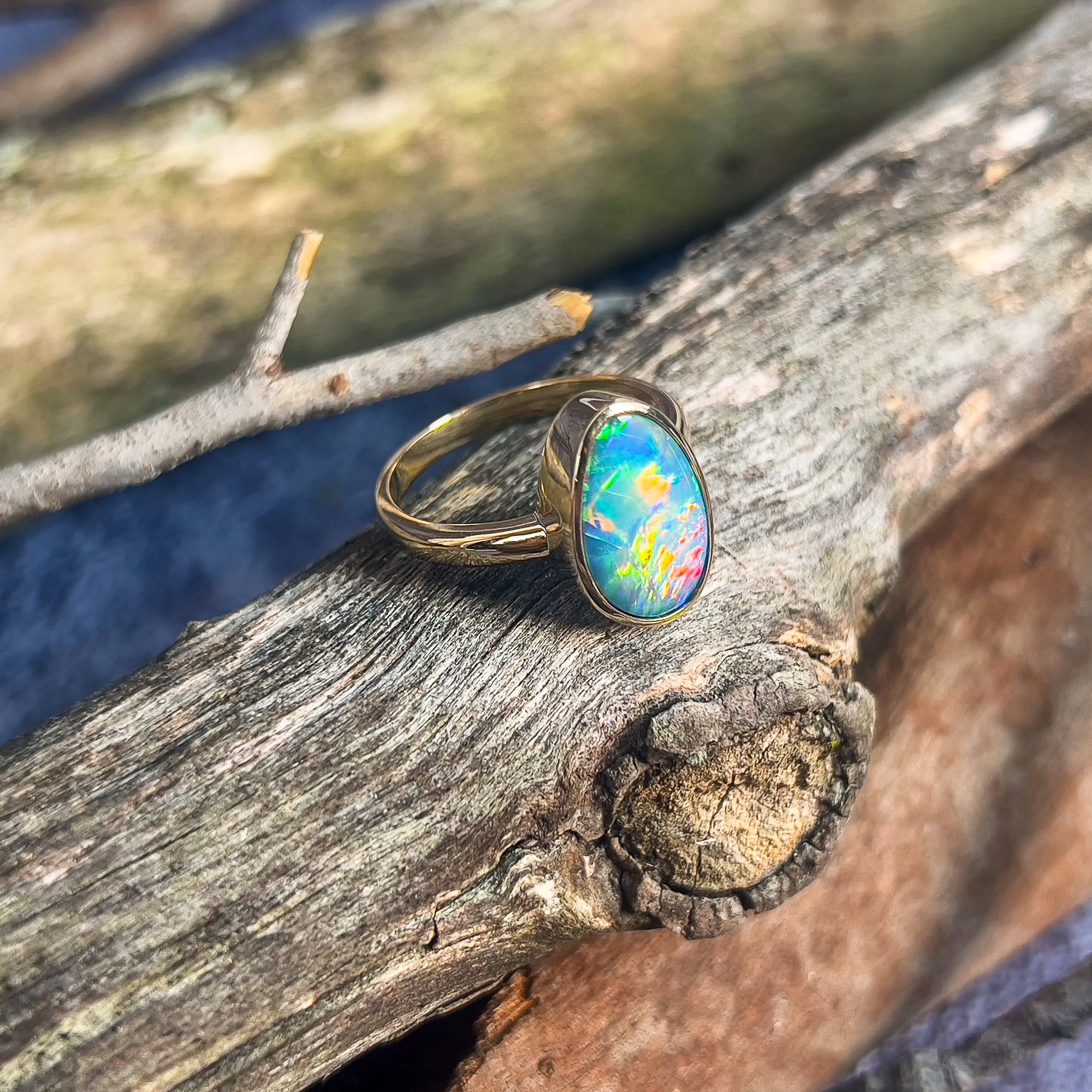14kt Yellow Gold solitaire Black Opal 2.9ct doublet bezel set ring