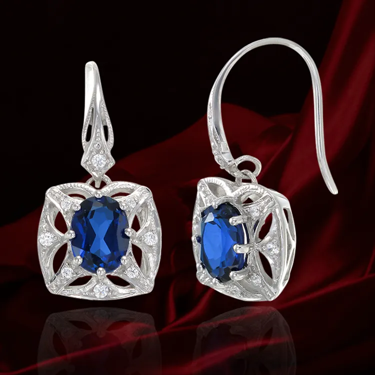 Graceful Blue Sapphire Earrings with Filigree Detail