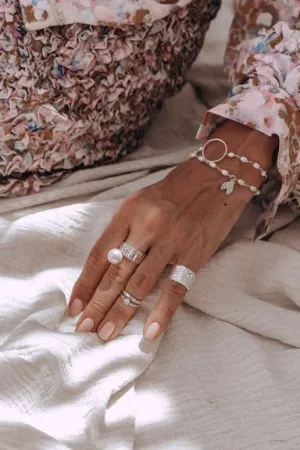 Infinity Bracelet With White Pearls